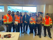 Calgary team members with Unifi CEO Gautam Thakkar.
